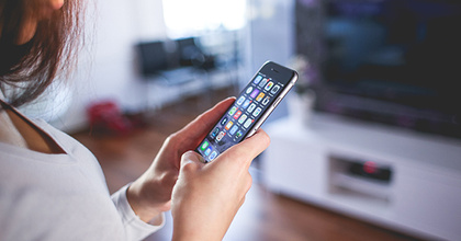 woman looking at her phone